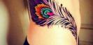 idee_tatouage_plume_tattoo